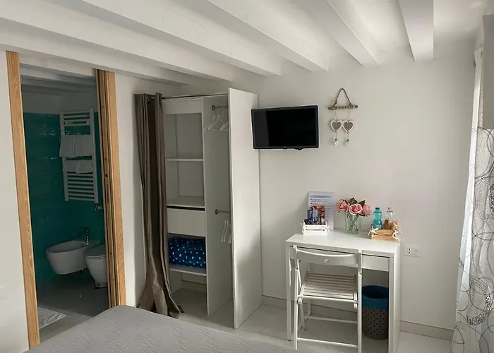 بيت ضيافة Laguna Blu Cielo Con Terrazza Panoramica In Comune